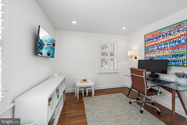 office space featuring dark wood-type flooring