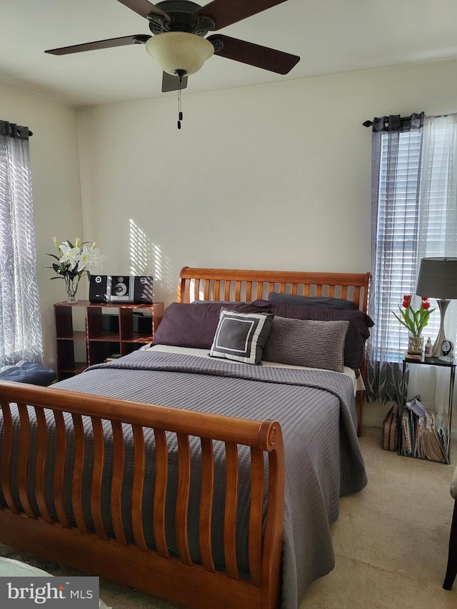 bedroom featuring carpet flooring and ceiling fan