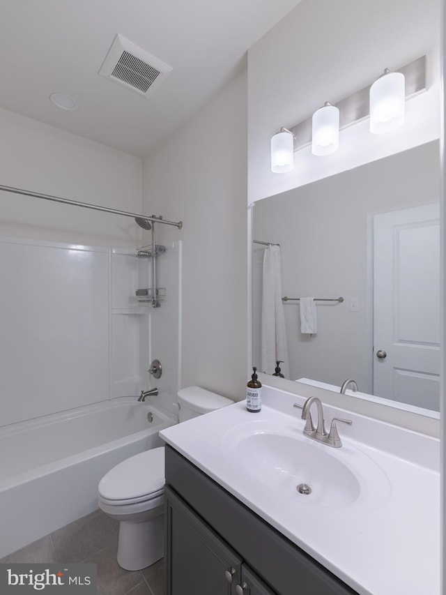 full bathroom featuring vanity, tile patterned flooring, shower / tub combination, and toilet