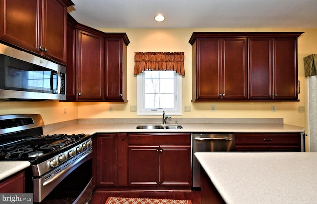 kitchen featuring stainless steel appliances and sink