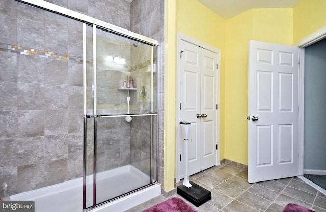 bathroom featuring an enclosed shower