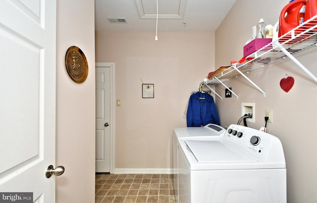 washroom with separate washer and dryer