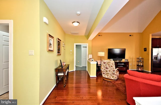 living room with dark hardwood / wood-style floors