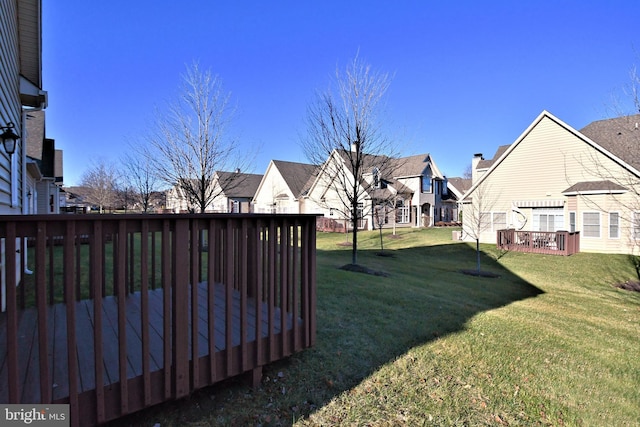 view of yard with a deck