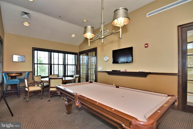 playroom featuring lofted ceiling and carpet flooring