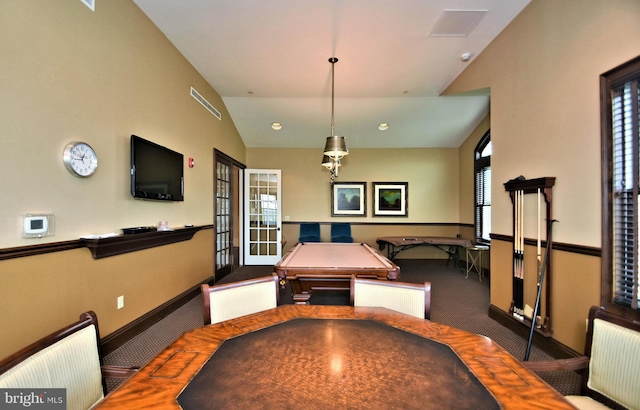 dining area featuring lofted ceiling, carpet floors, radiator heating unit, and billiards