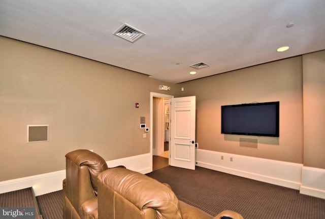 living room featuring dark carpet