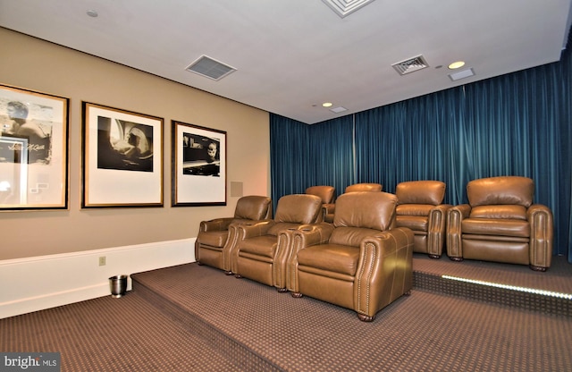 cinema room featuring carpet floors