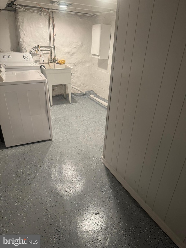 laundry room featuring washer / clothes dryer and sink