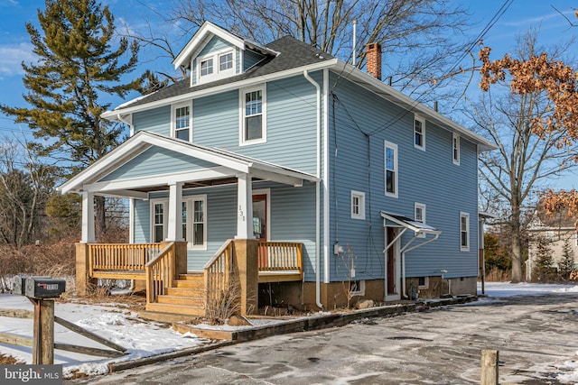 view of property with covered porch