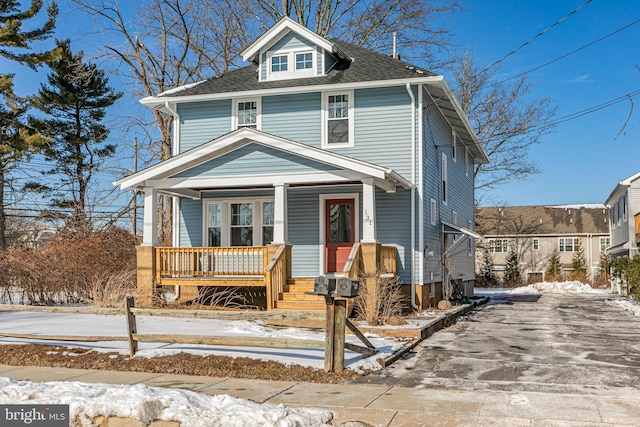 view of property featuring a porch