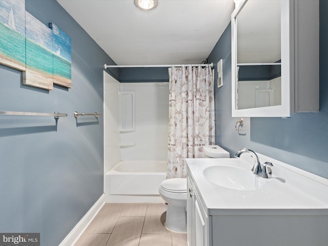 full bathroom featuring vanity, toilet, and shower / tub combo