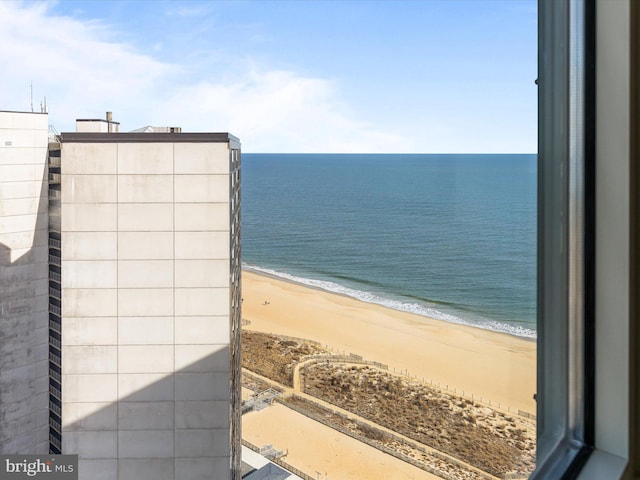 view of water feature with a beach view