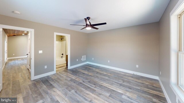 unfurnished bedroom with wood-type flooring and ceiling fan