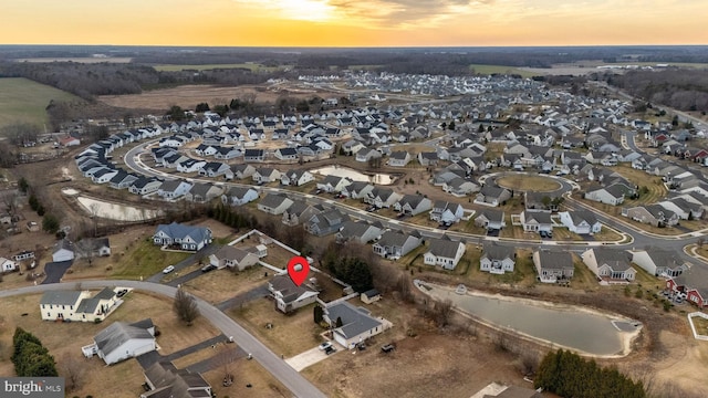 view of aerial view at dusk