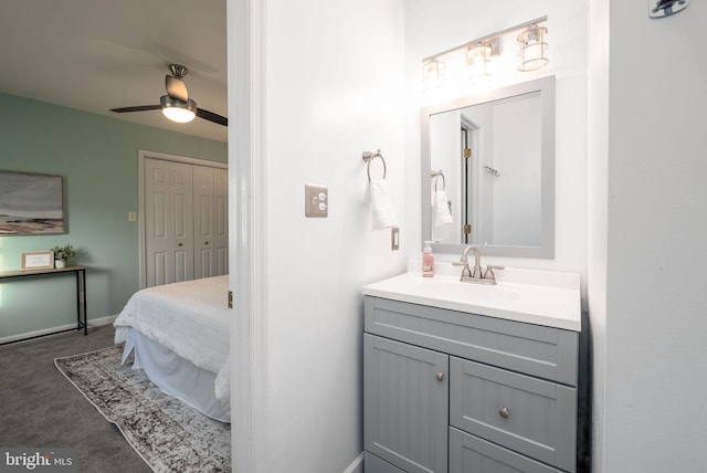 bathroom featuring vanity and ceiling fan