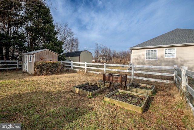 view of yard with a storage unit