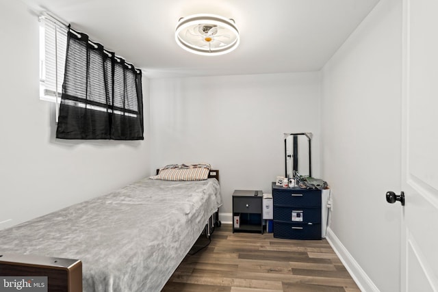 bedroom featuring dark hardwood / wood-style floors