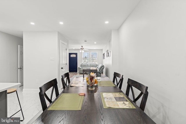 dining area with ceiling fan