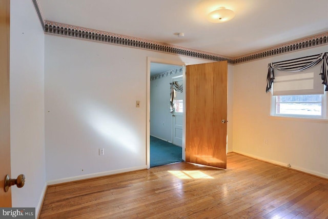 unfurnished bedroom featuring light hardwood / wood-style floors