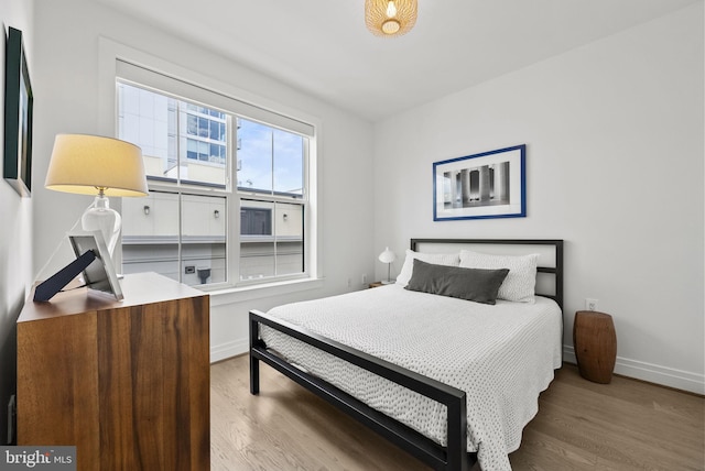 bedroom featuring hardwood / wood-style floors