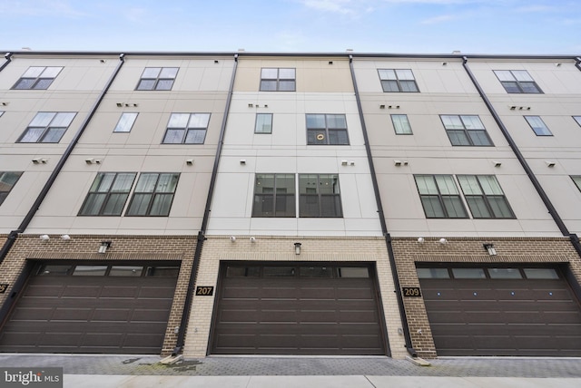 view of building exterior with a garage