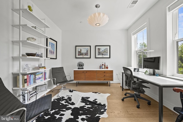 office area with light wood-type flooring