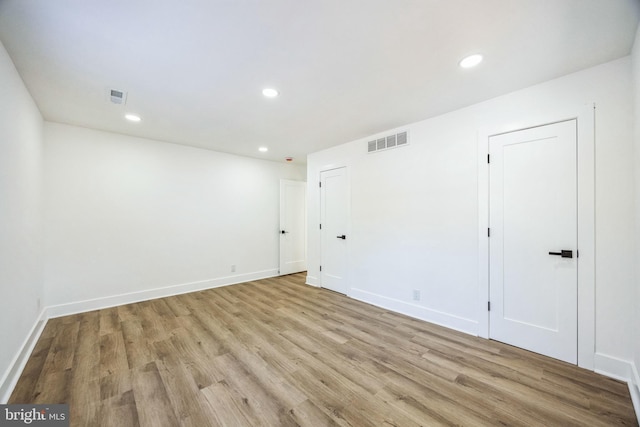 empty room featuring light wood-type flooring