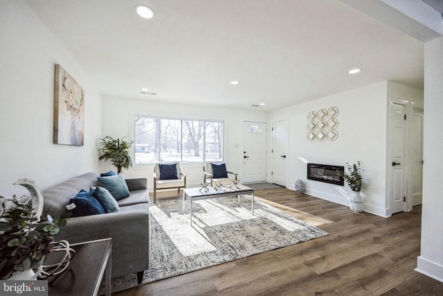 living room featuring dark hardwood / wood-style floors