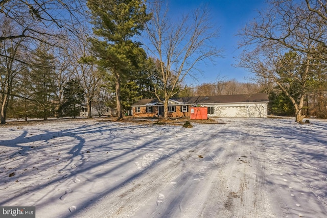 ranch-style home with a garage