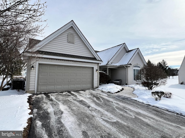 view of front of property featuring a garage