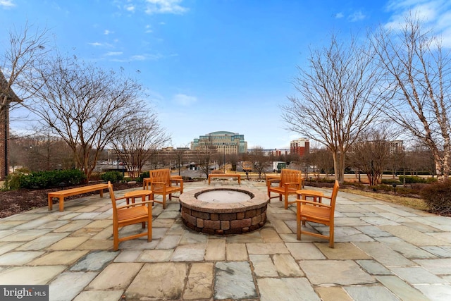 view of patio featuring an outdoor fire pit