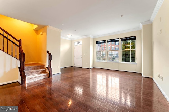 interior space with ornamental molding and dark hardwood / wood-style floors