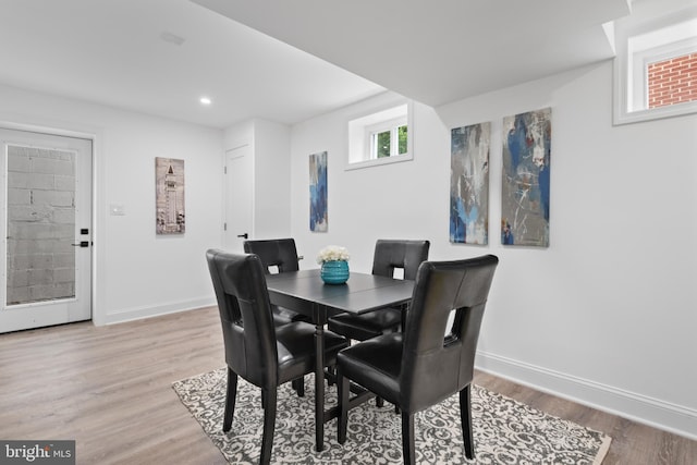 dining room with light hardwood / wood-style floors