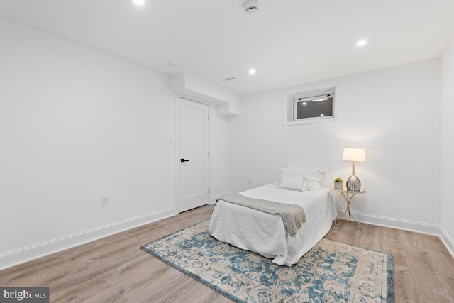 bedroom featuring light hardwood / wood-style floors