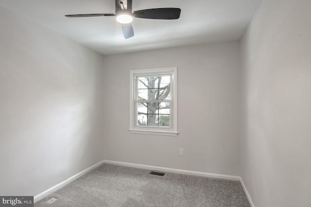 unfurnished room with carpet floors and ceiling fan