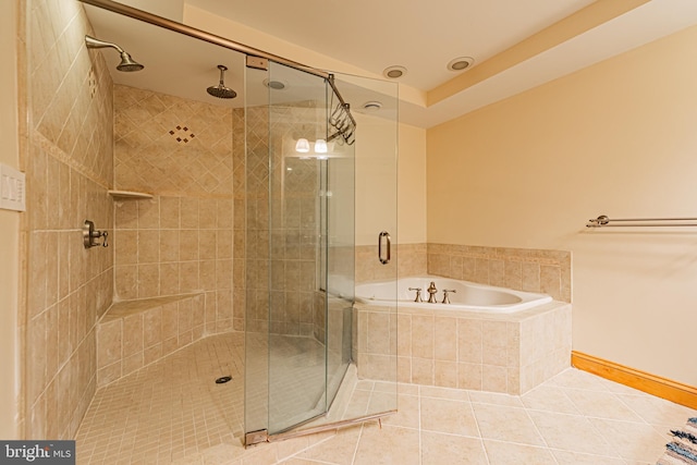 bathroom with tile patterned flooring and independent shower and bath