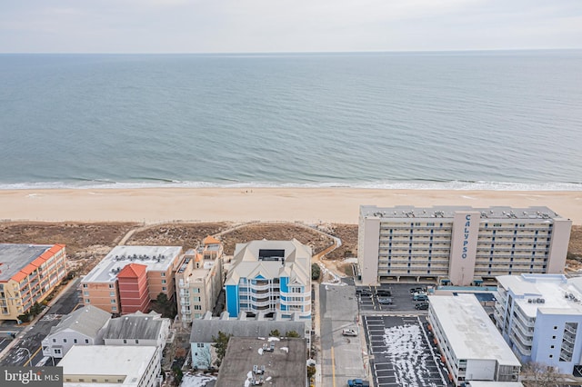 drone / aerial view with a view of the beach and a water view