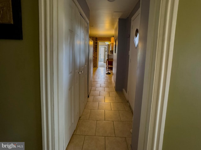 hallway with light tile patterned flooring