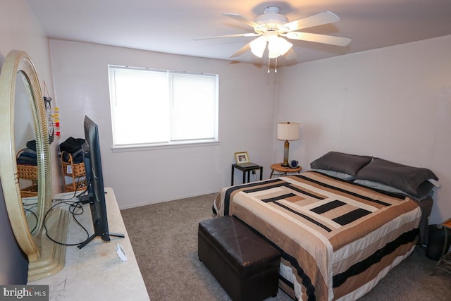 bedroom featuring ceiling fan and carpet flooring