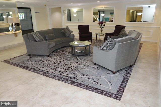 living room featuring crown molding