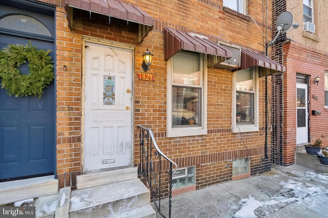 property entrance with cooling unit