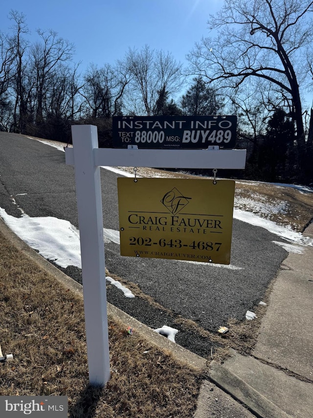 view of community sign