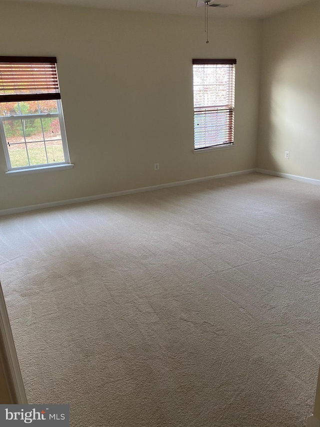 empty room with carpet floors