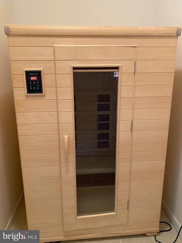 view of sauna / steam room featuring tile patterned floors