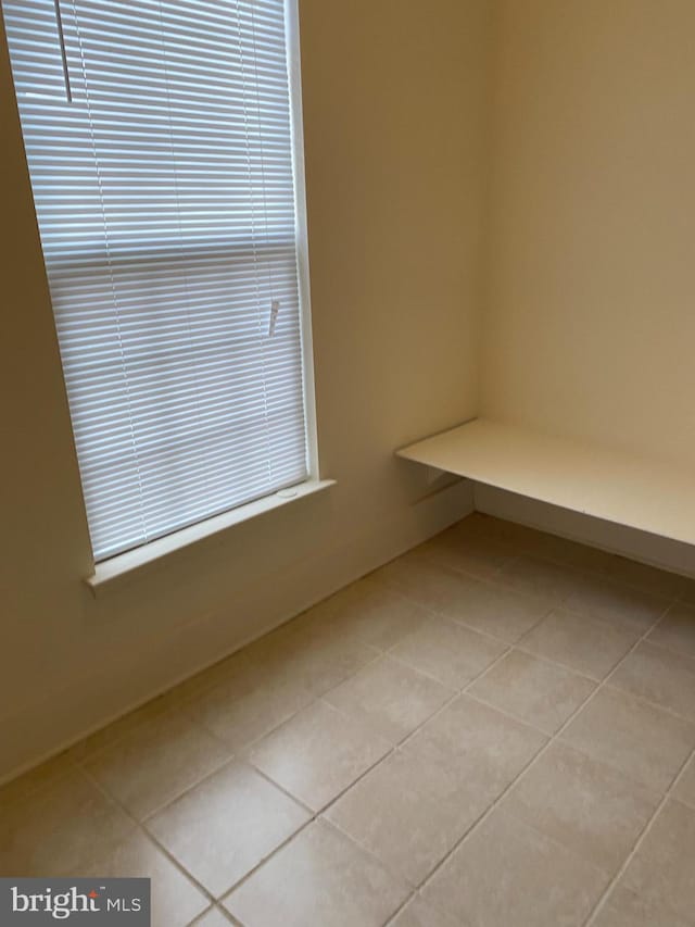 interior space featuring light tile patterned floors