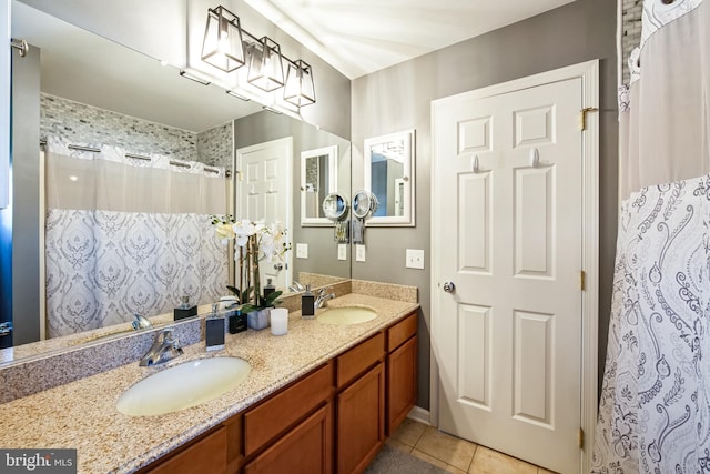 bathroom featuring tile patterned floors and vanity