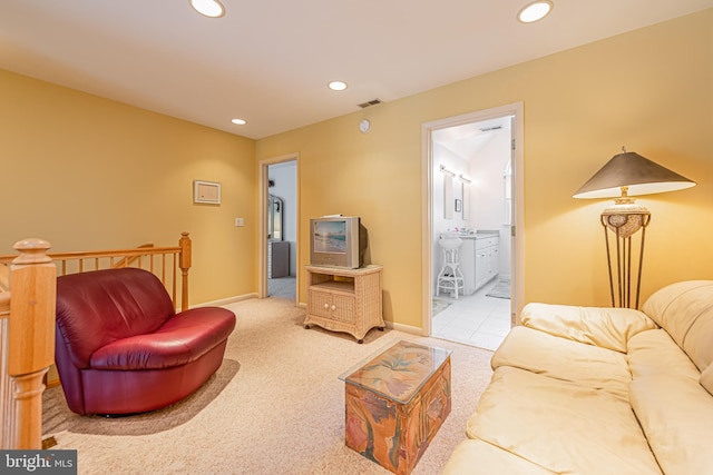 living room featuring light colored carpet