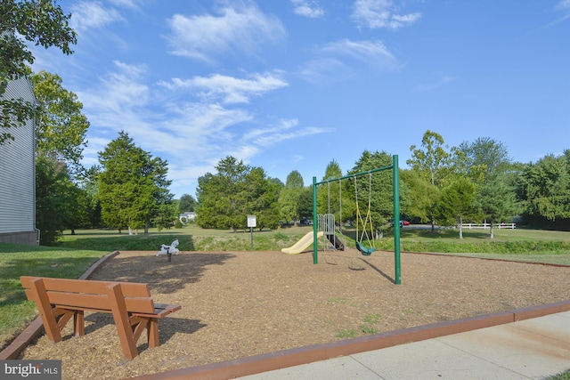 view of jungle gym featuring a yard