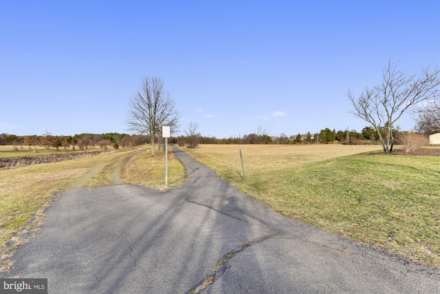 view of street featuring a rural view